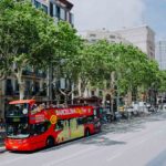 Barcelona, Spain – April 26, 2018: Barcelona City Tour Touristic Bus With Tourists On The Route Arou