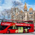 Barcelona – March, 2018: Touristic Hop-on Hop-off Bus At Gran Via De Les Corts In Barcelona